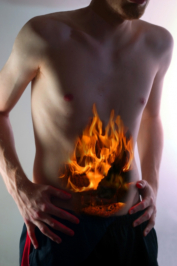 diagram of abdomen with fire superimposed on top